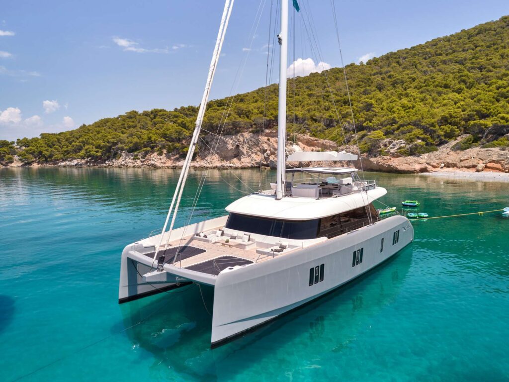Above & Beyond at anchor in The Ionian Sea in Greece. An award winning Sunreef 80 available for private crewed yacht charter by Wlms Yacht Charters