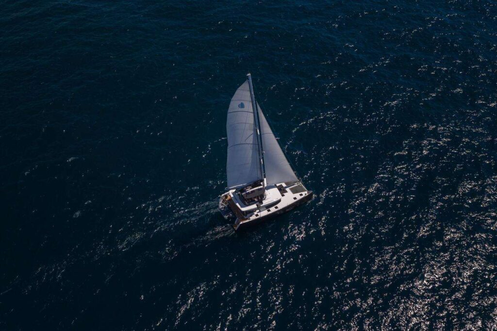 Nomad underway: A 6 cabin Lagoon 52 is available for private crewed yacht charter in Greece.