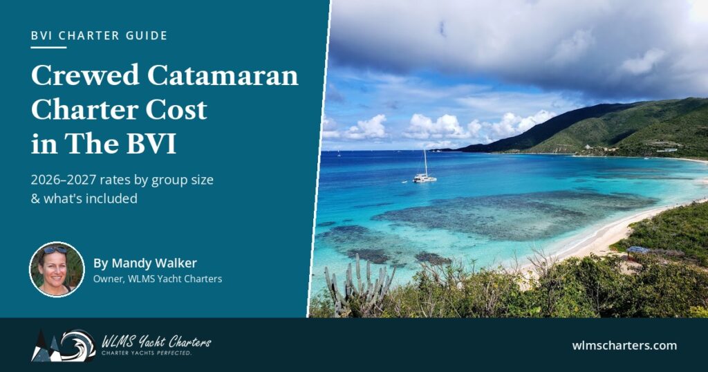 Crewed catamaran at anchor off a white-sand beach in The BVI — 2026–2027 charter cost guide by Mandy Walker, WLMS Yacht Charters
